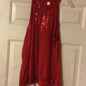 Red blouses with sequences